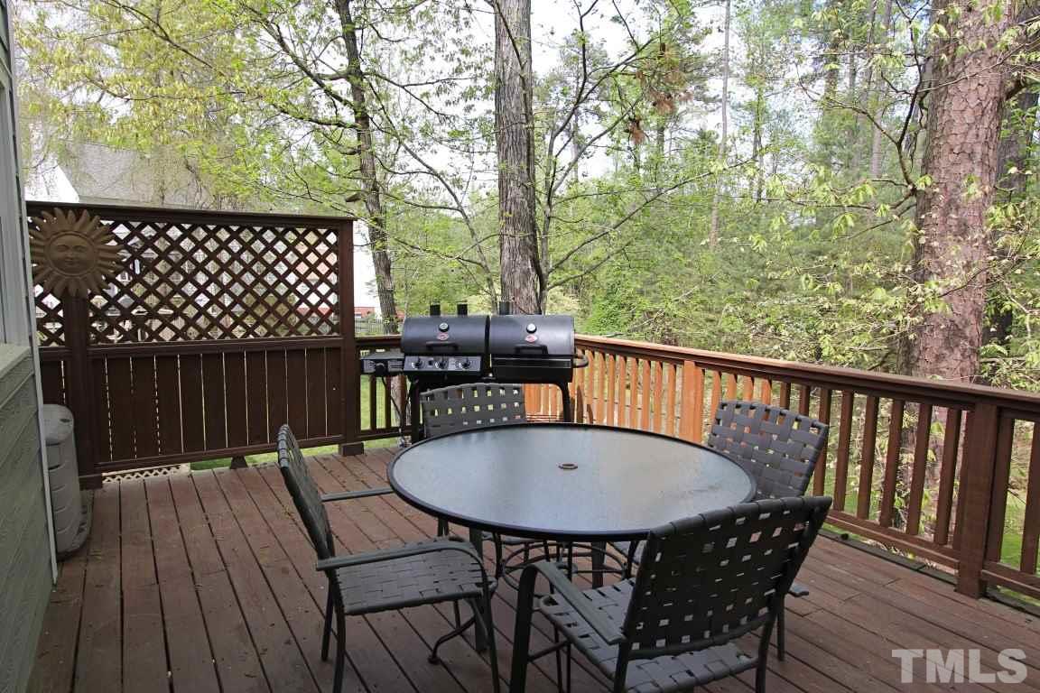 2720 Dahlgreen Road Raleigh, NC 27615 - Photo 17 of 25 a view of a chairs and table on the wooden floor