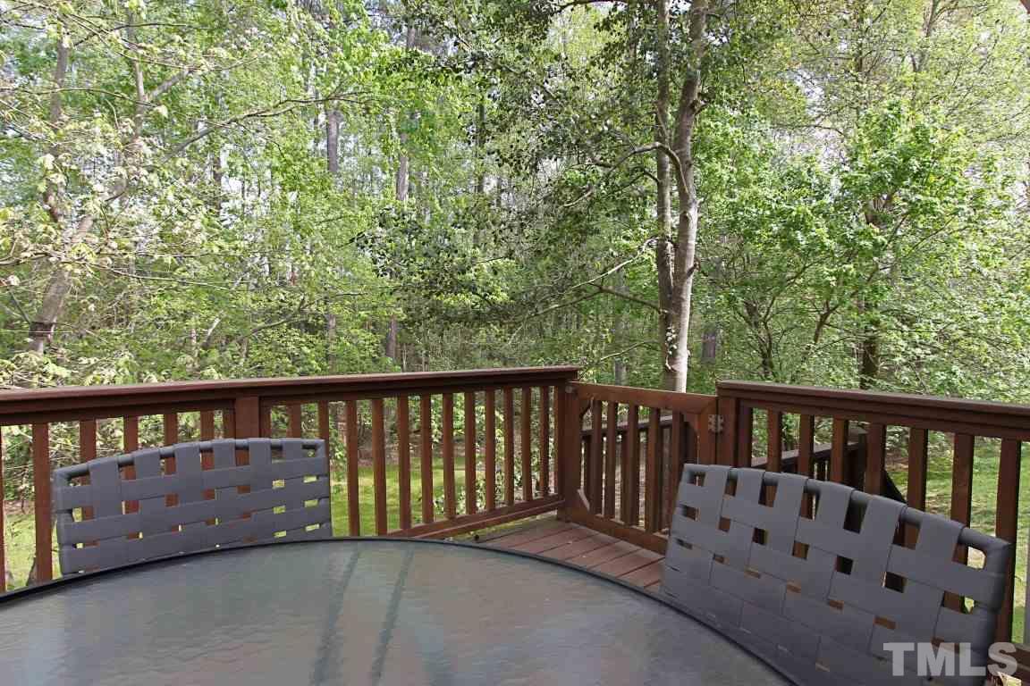2720 Dahlgreen Road Raleigh, NC 27615 - Photo 19 of 25 a balcony with wooden floor and fence