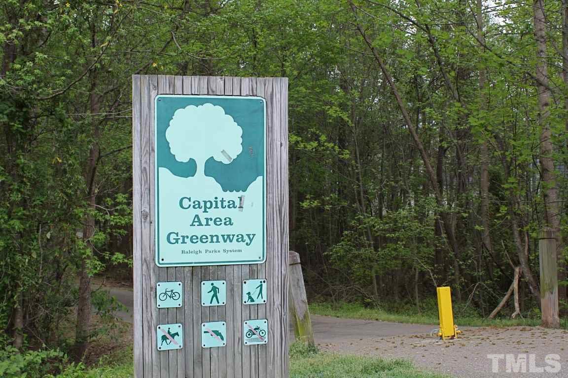 2720 Dahlgreen Road Raleigh, NC 27615 - Photo 21 of 25 a sign on the side of the road