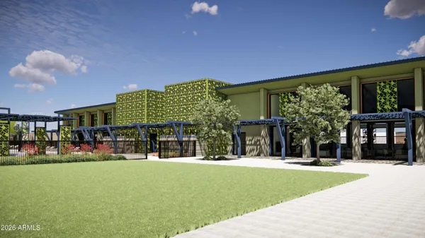 a front view of building with yard