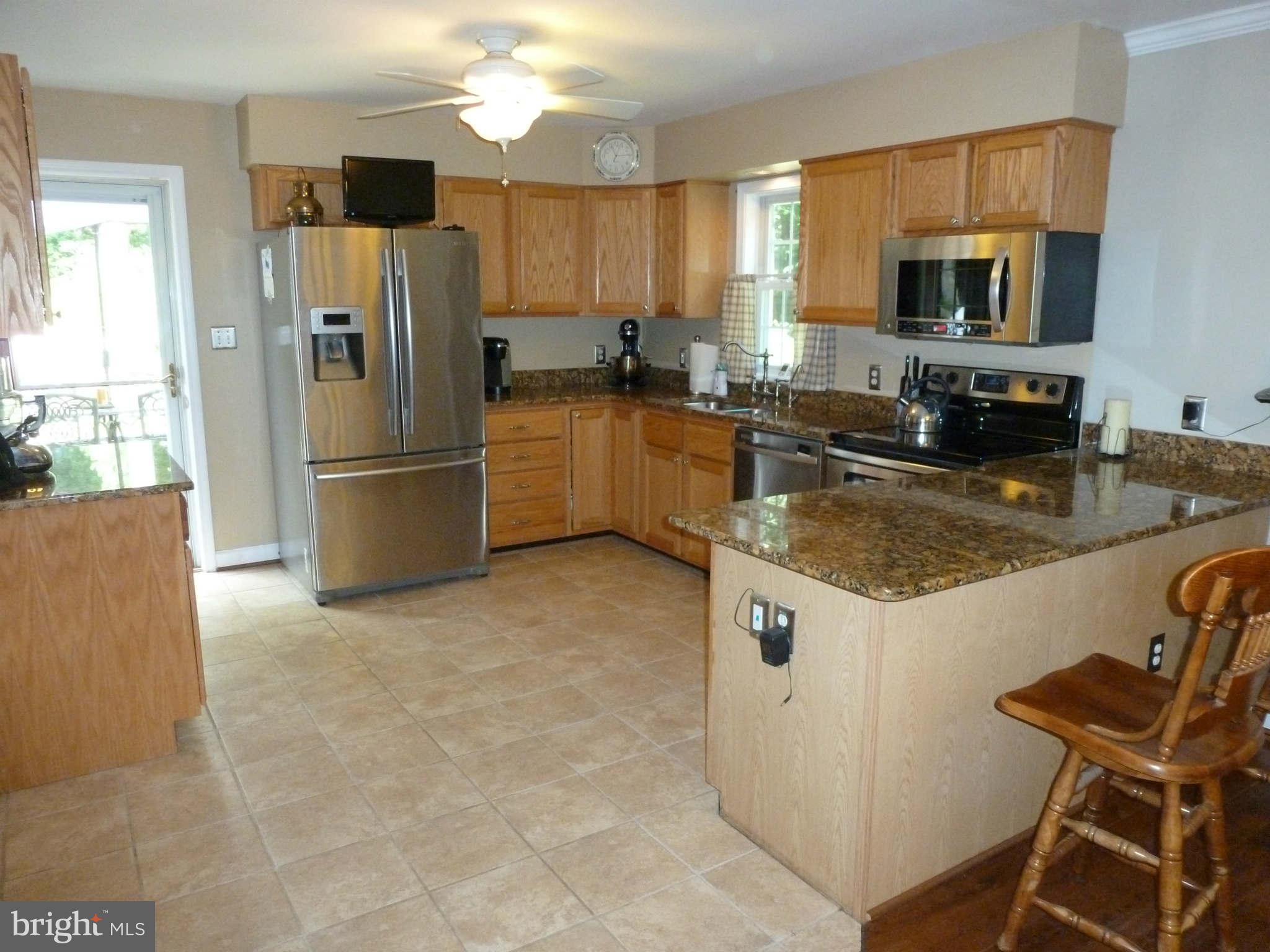 13600 Loy Wolfe Road Smithsburg, MD 21783 - Photo 13 of 28 Upgraded SS appliances, granite, oak & ceramic