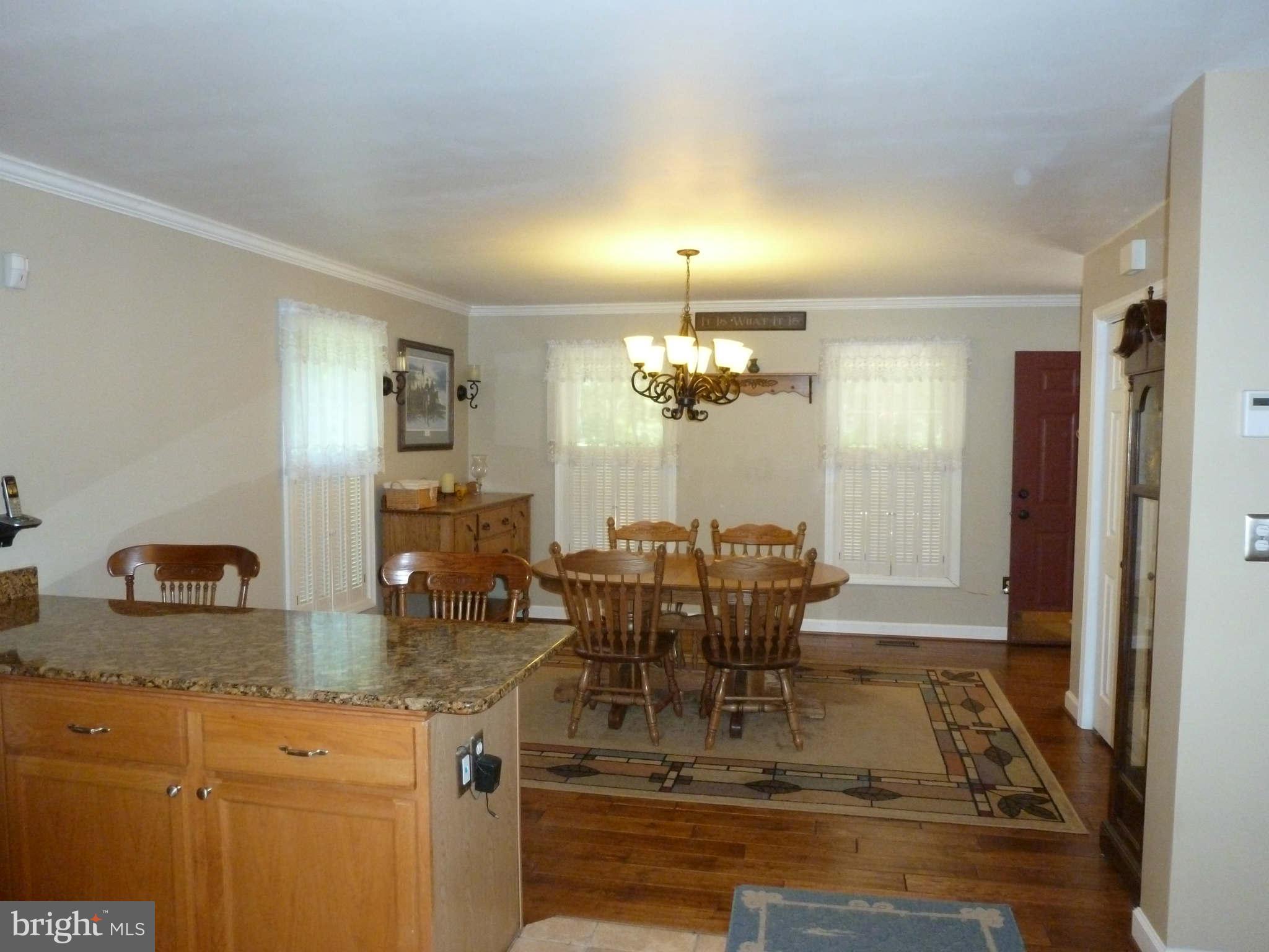 13600 Loy Wolfe Road Smithsburg, MD 21783 - Photo 15 of 28 DR is separated from kitchen by large peninsula