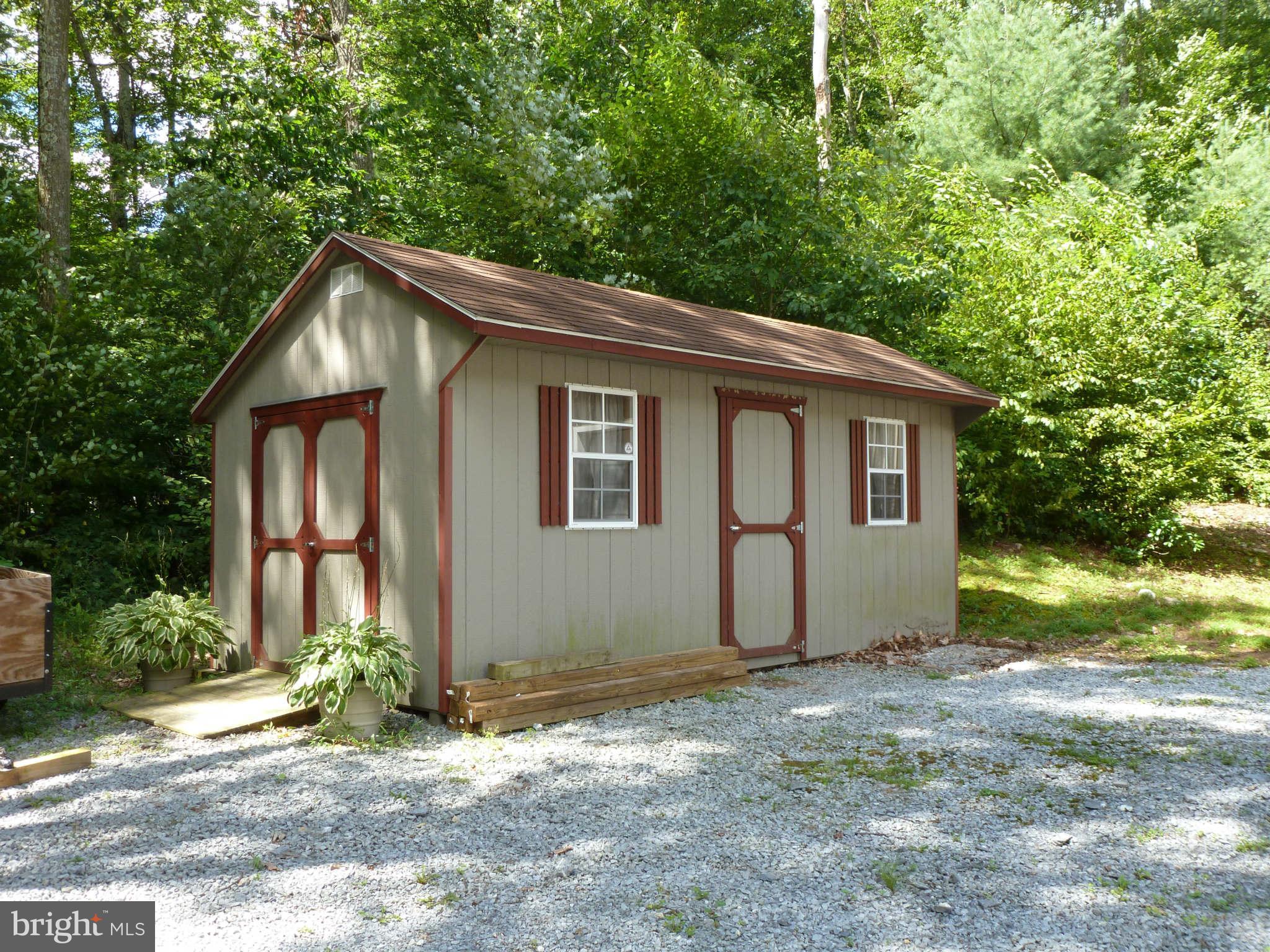 13600 Loy Wolfe Road Smithsburg, MD 21783 - Photo 27 of 28 Large shed beside big parking area