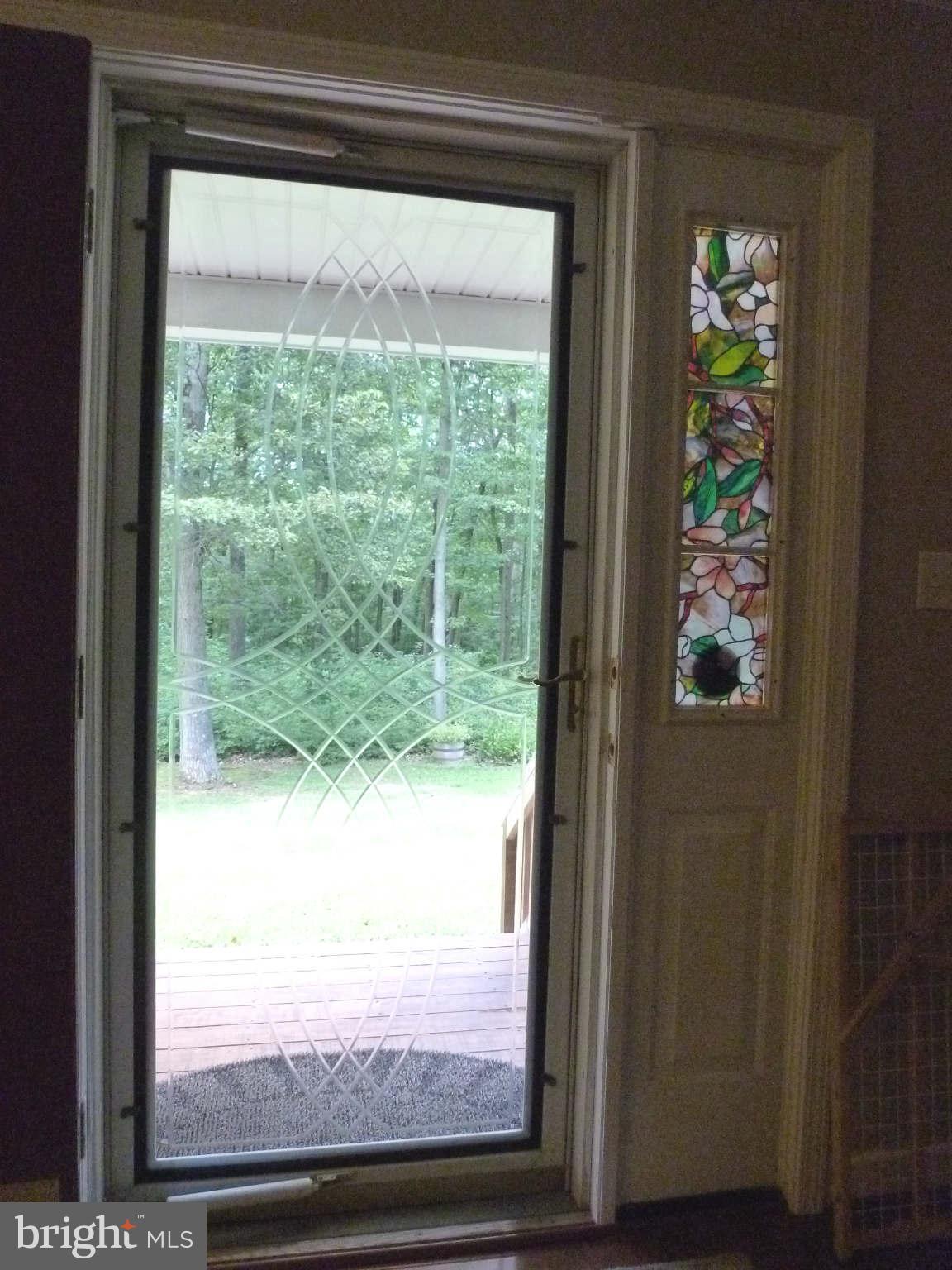 13600 Loy Wolfe Road Smithsburg, MD 21783 - Photo 4 of 28 Storm door has full, etched glass