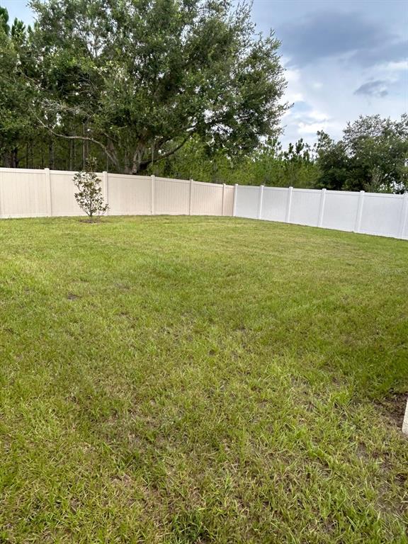 814 Sun Burst Road Winter Haven, FL 33880 - Photo 48 of 48 a view of an outdoor space and a yard