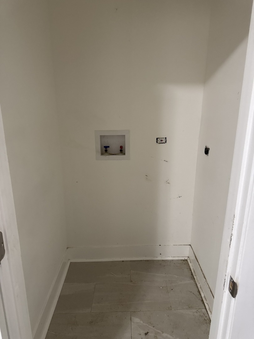 310 West 105th Street Chicago, IL 60628 - Photo 13 of 22 an empty room with a door