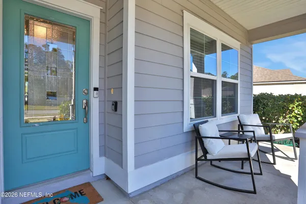 a bedroom with a bed and a book shelf