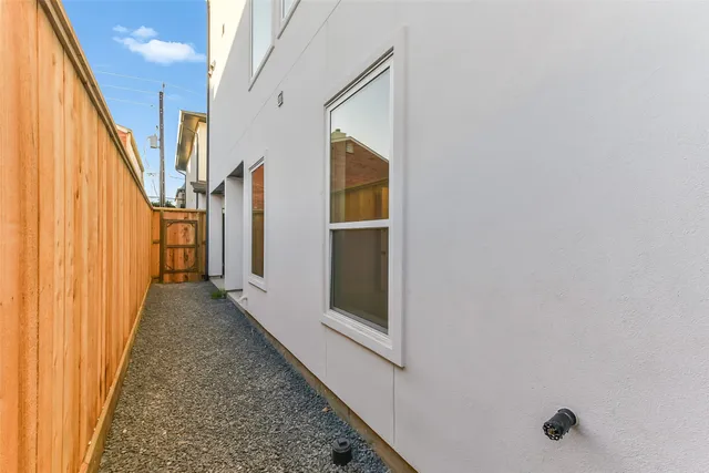 a view of a hallway with staircase