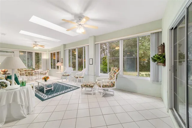 an aerial view of a house with a yard and a garden