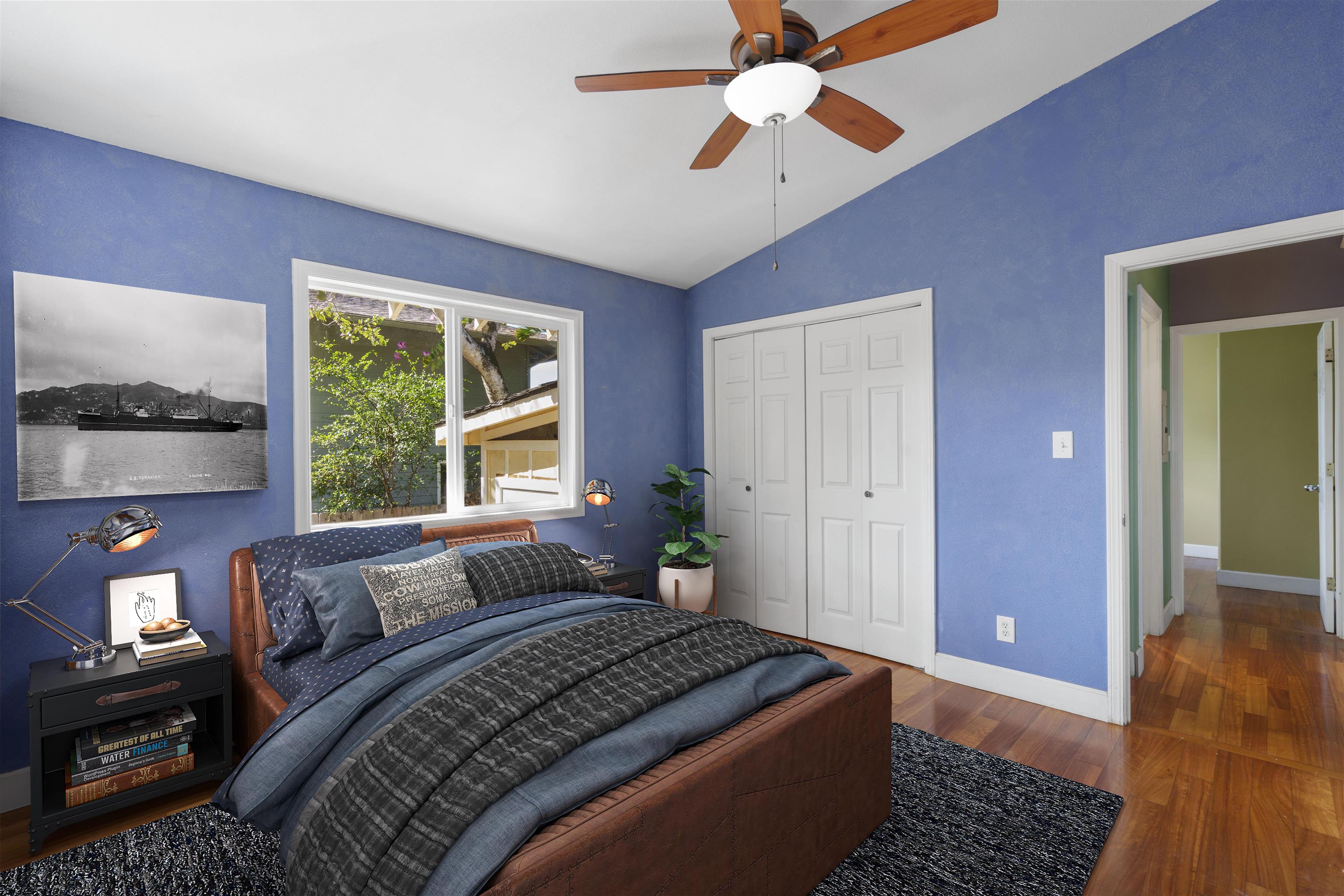 44 Puu KOA Place Haiku, HI 96708 - Photo 23 of 42 a bedroom with a bed and a chandelier