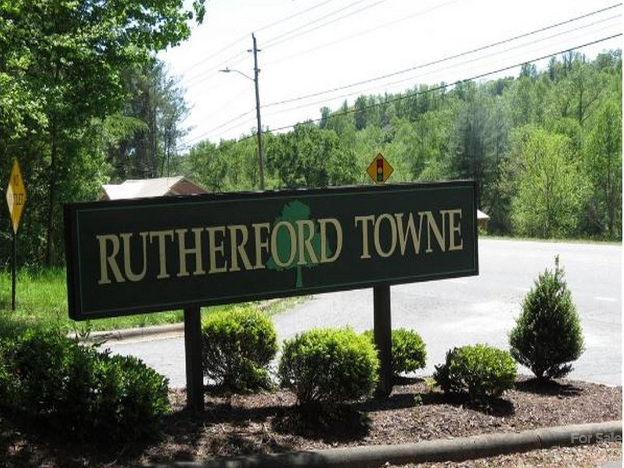 0 General Griffith Circle, Unit 25 Rutherfordton, NC 28139 - Photo 6 of 10 a sign broad on the side of a road