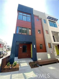 402 Transport Tustin, CA 92782 - Photo 1 of 26 a front view of a building