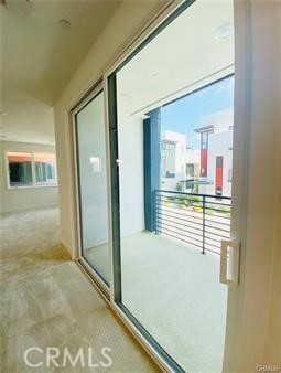 402 Transport Tustin, CA 92782 - Photo 16 of 26 a view of a living room with a wooden floor