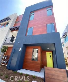 402 Transport Tustin, CA 92782 - Photo 2 of 26 a view of a building with a door
