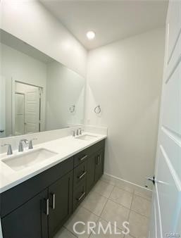 402 Transport Tustin, CA 92782 - Photo 21 of 26 a bathroom with a sink and a mirror