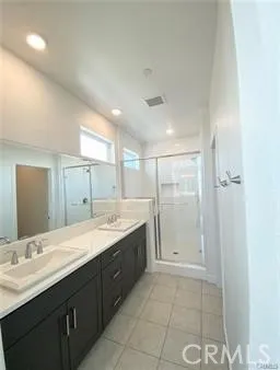 a bathroom with a granite countertop sink mirror and a