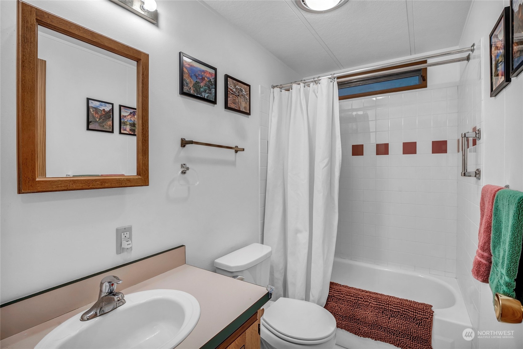 24106 10th Place West Bothell, WA 98021 - Photo 11 of 29 a bathroom with a sink a toilet and shower