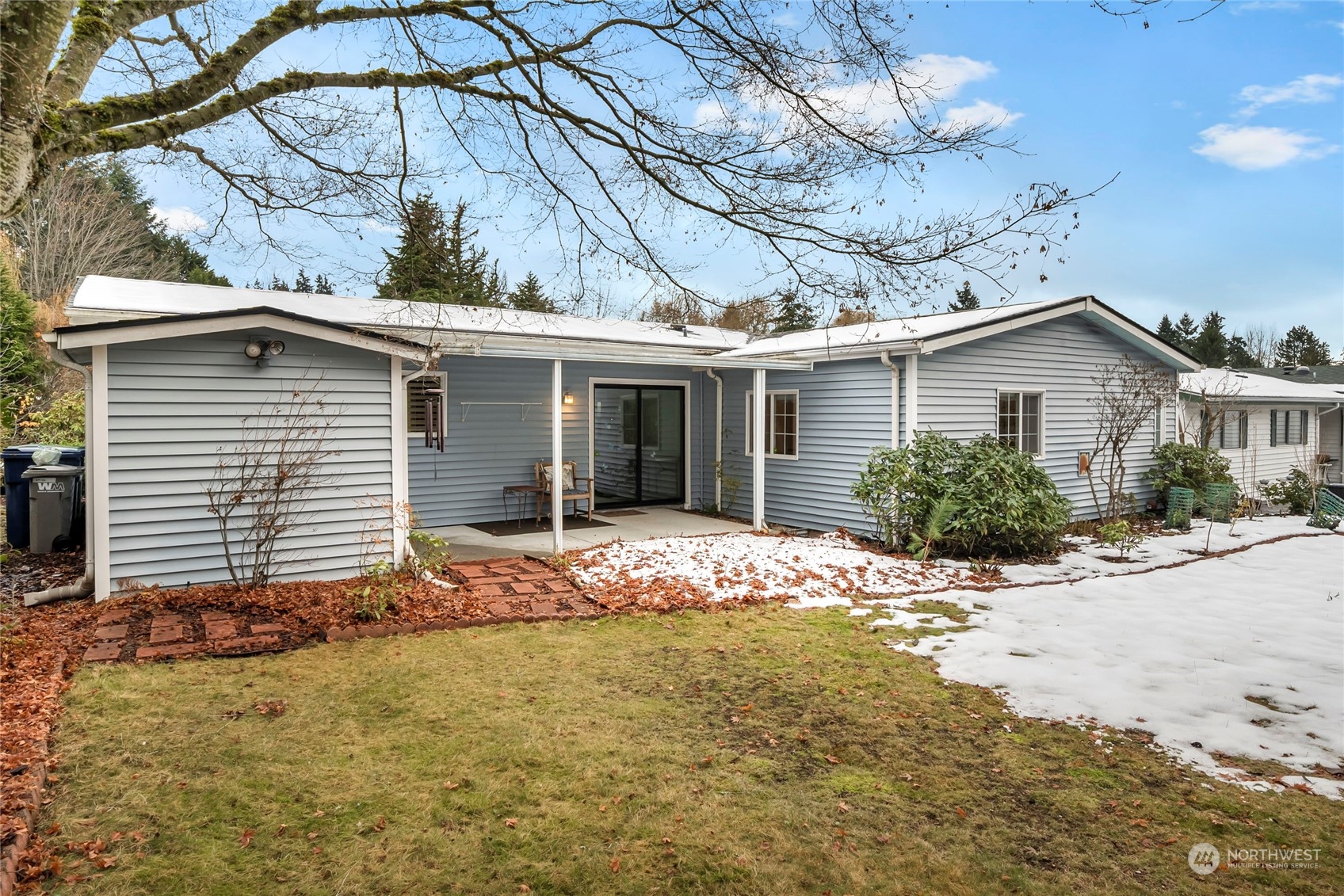 24106 10th Place West Bothell, WA 98021 - Photo 21 of 29 a front view of house with yard outdoor seating and barbeque oven