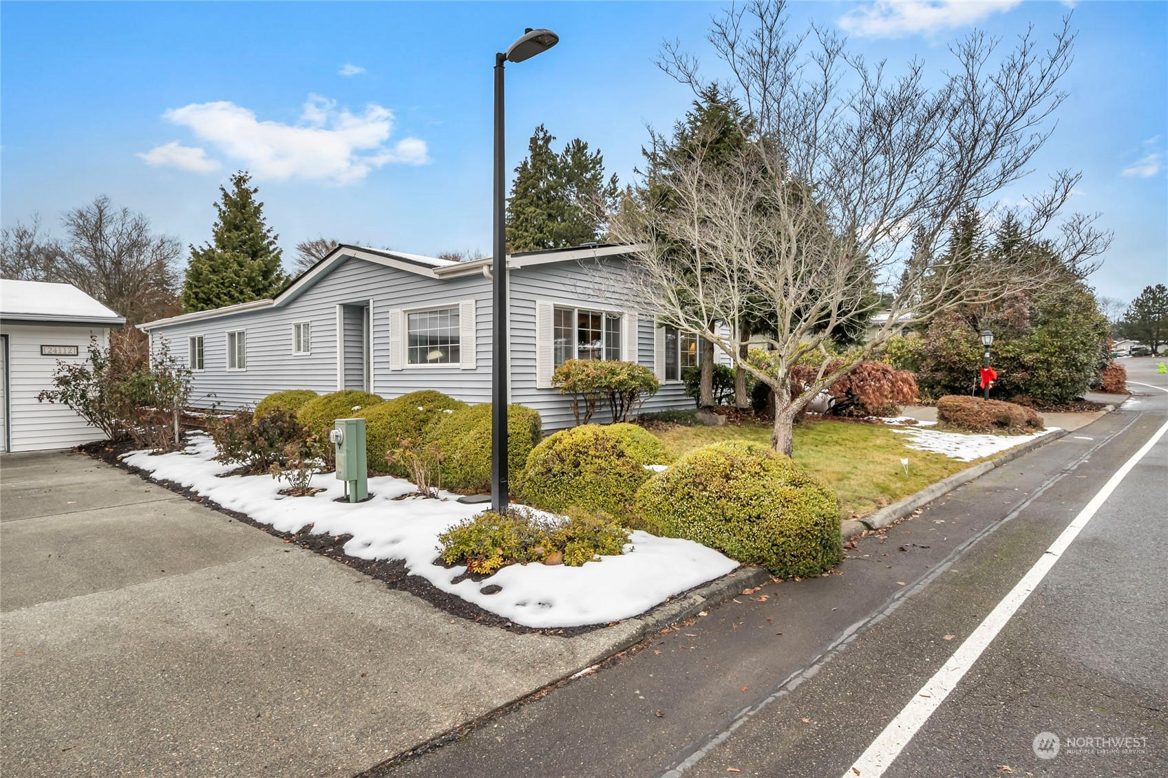 24106 10th Place West Bothell, WA 98021 - Photo 3 of 29 a view of a house with backyard and sitting area