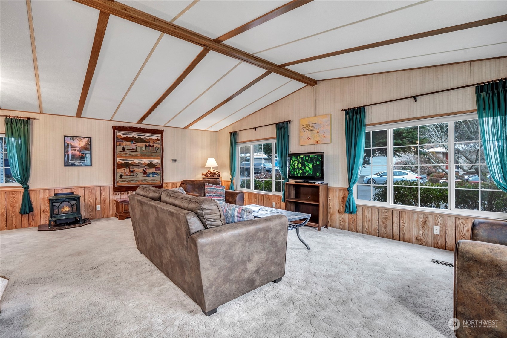 24106 10th Place West Bothell, WA 98021 - Photo 4 of 29 a living room with furniture and a floor to ceiling window