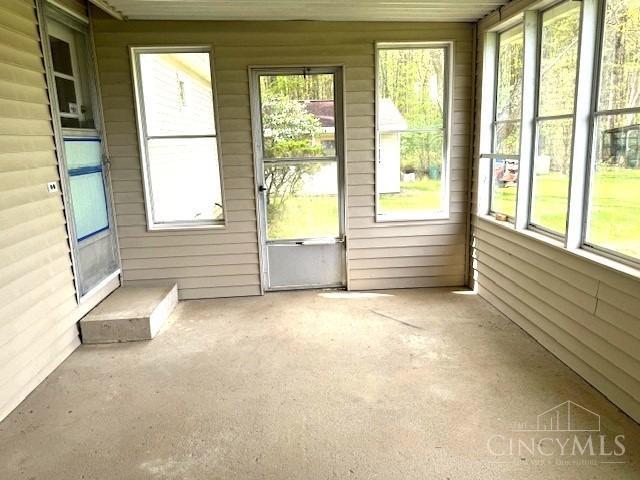 3903 Afton-Elklick Road Batavia, OH 45103 - Photo 14 of 25 Rear Enclosed Porch with walk-out, walk-in kitchen, walk-into attached garage.