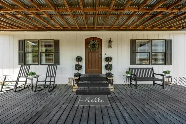 a front view of a house with wooden floor