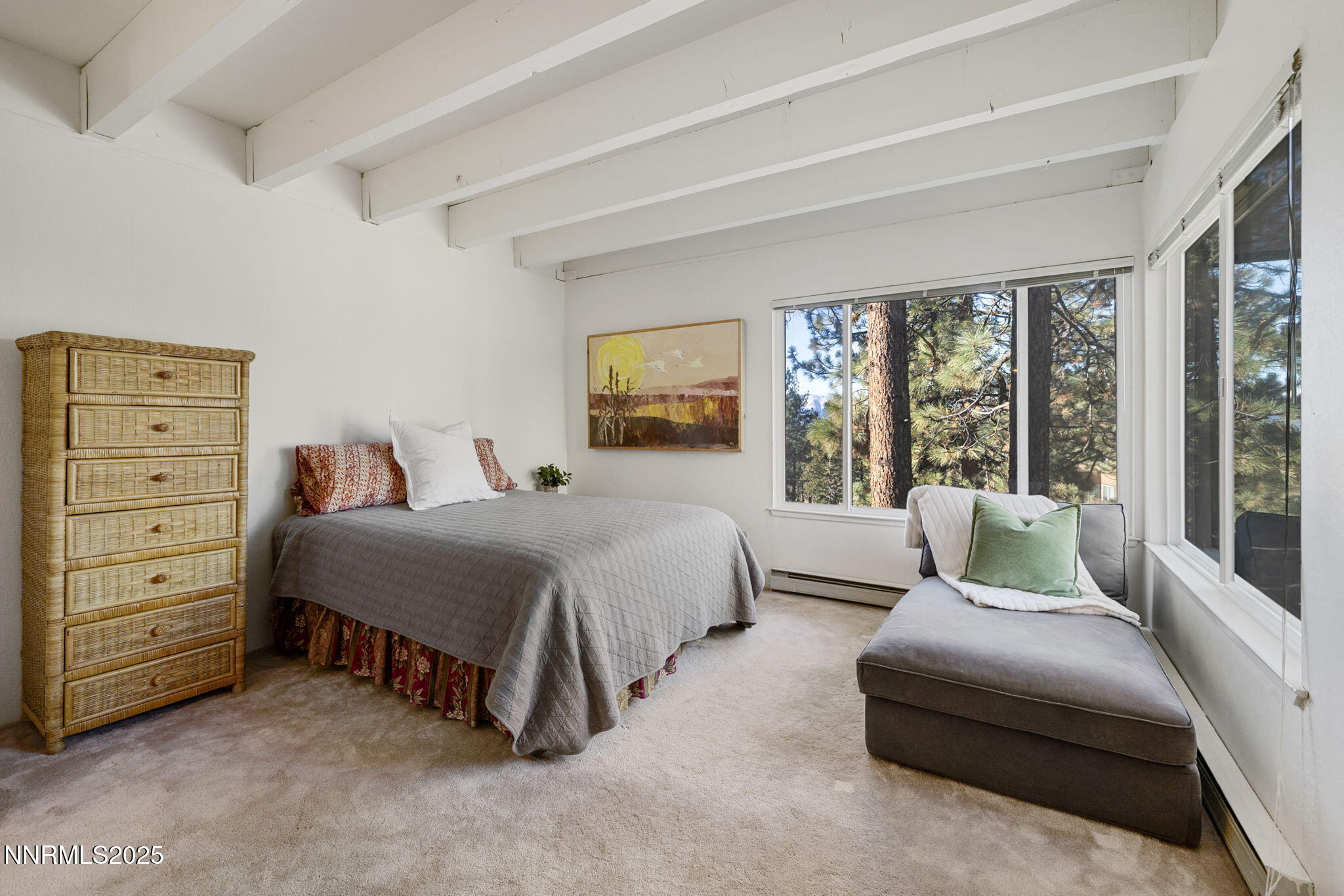 205 Clubhouse Circle Stateline, NV 89449 - Photo 15 of 27 a bedroom with a bed and large window