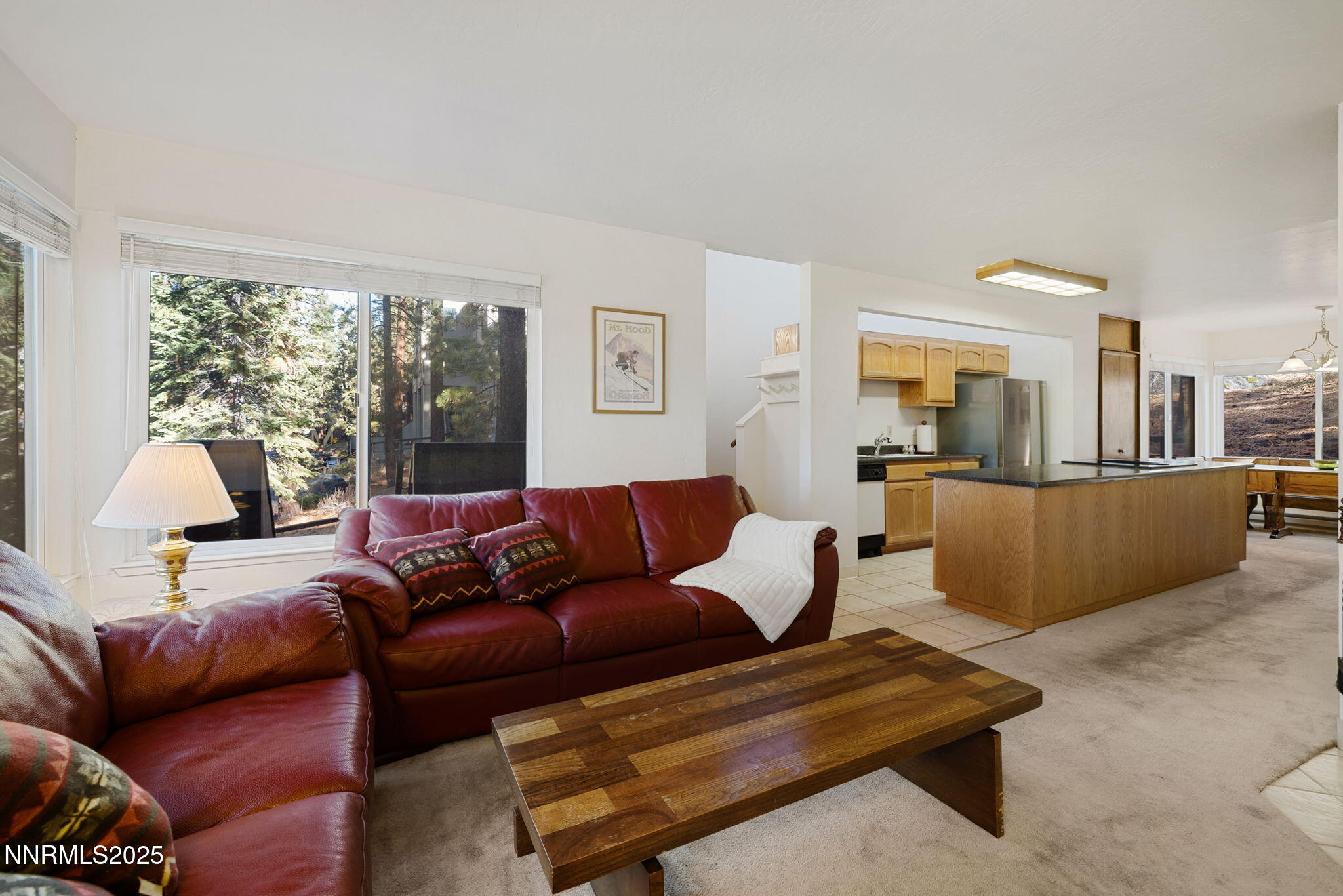 205 Clubhouse Circle Stateline, NV 89449 - Photo 5 of 27 a living room with furniture and a large window