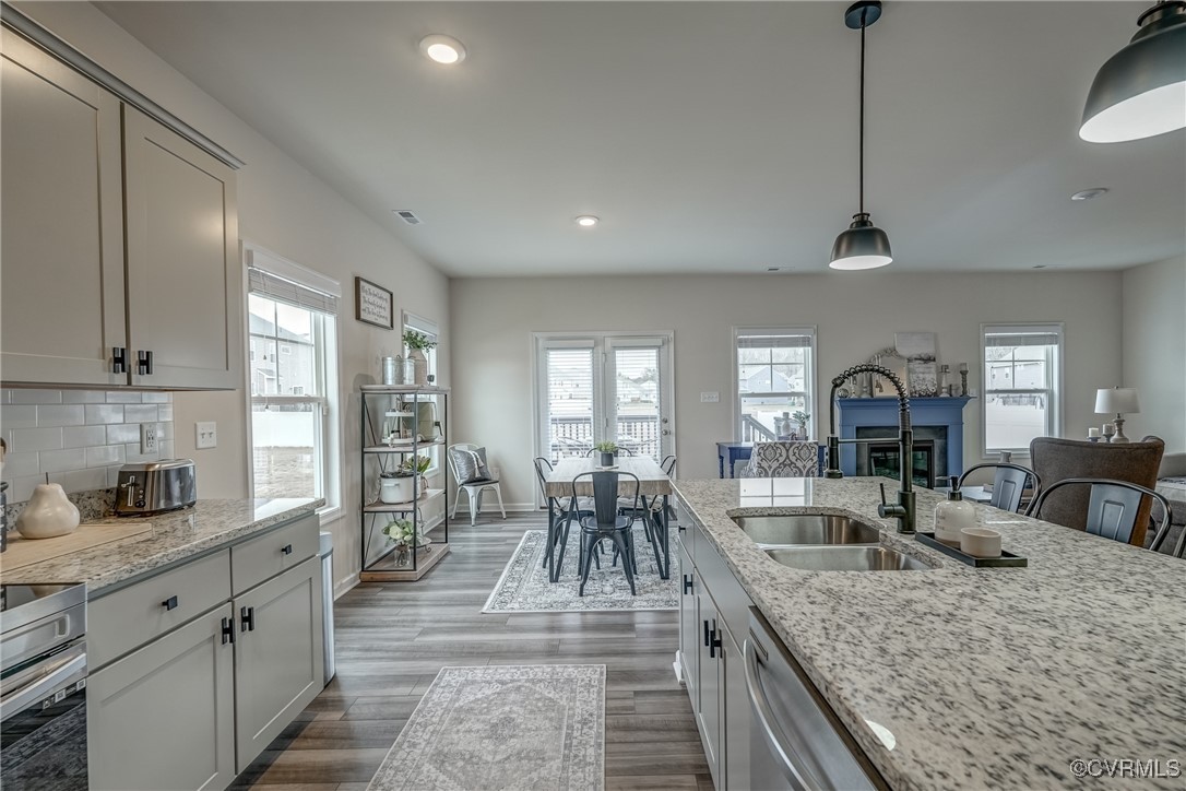 7004 Havering Way Henrico, VA 23231 - Photo 18 of 50 Kitchen with hanging light fixtures, tasteful back