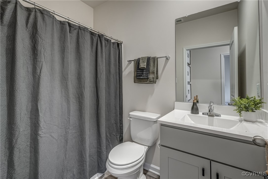 7004 Havering Way Henrico, VA 23231 - Photo 28 of 50 Bathroom with vanity and toilet