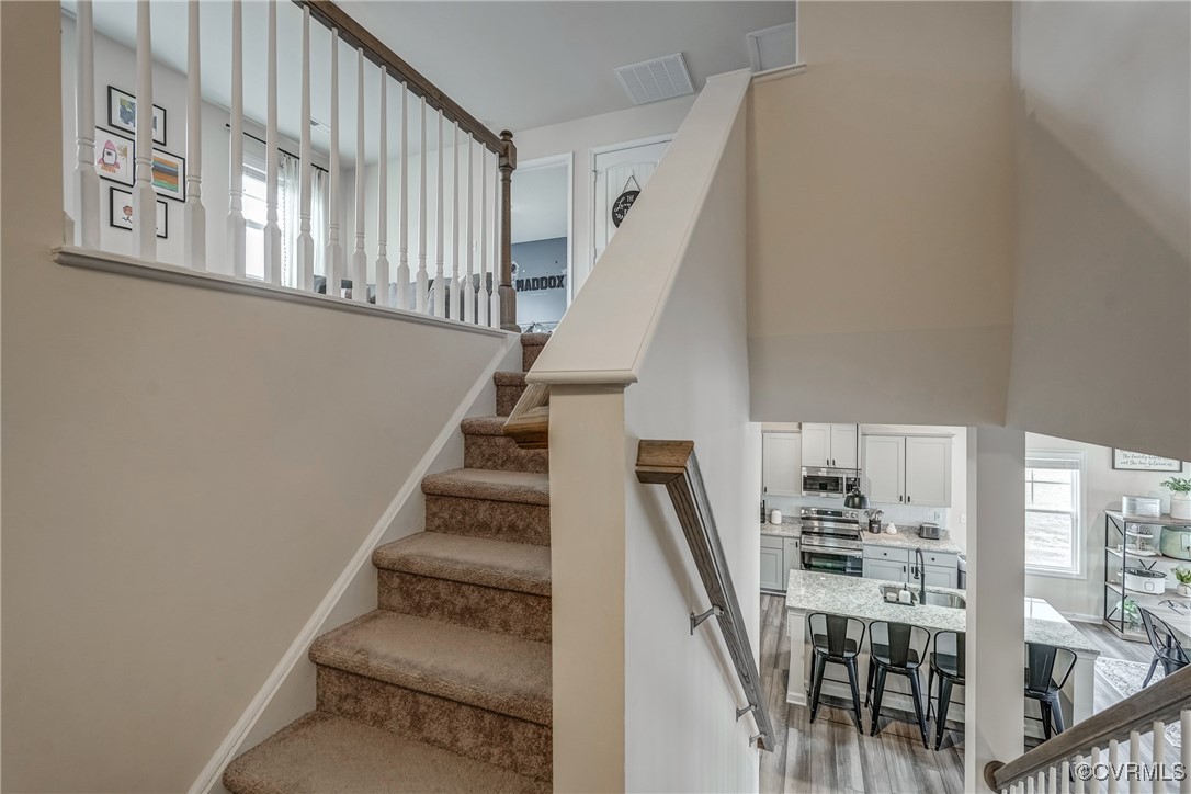 7004 Havering Way Henrico, VA 23231 - Photo 30 of 50 Stairs with sink