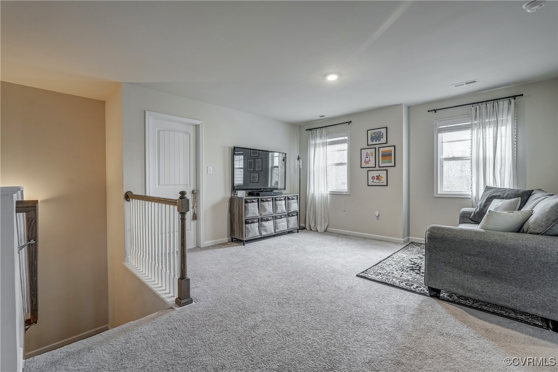 7004 Havering Way Henrico, VA 23231 - Photo 31 of 50 Carpeted living room featuring a healthy amount of