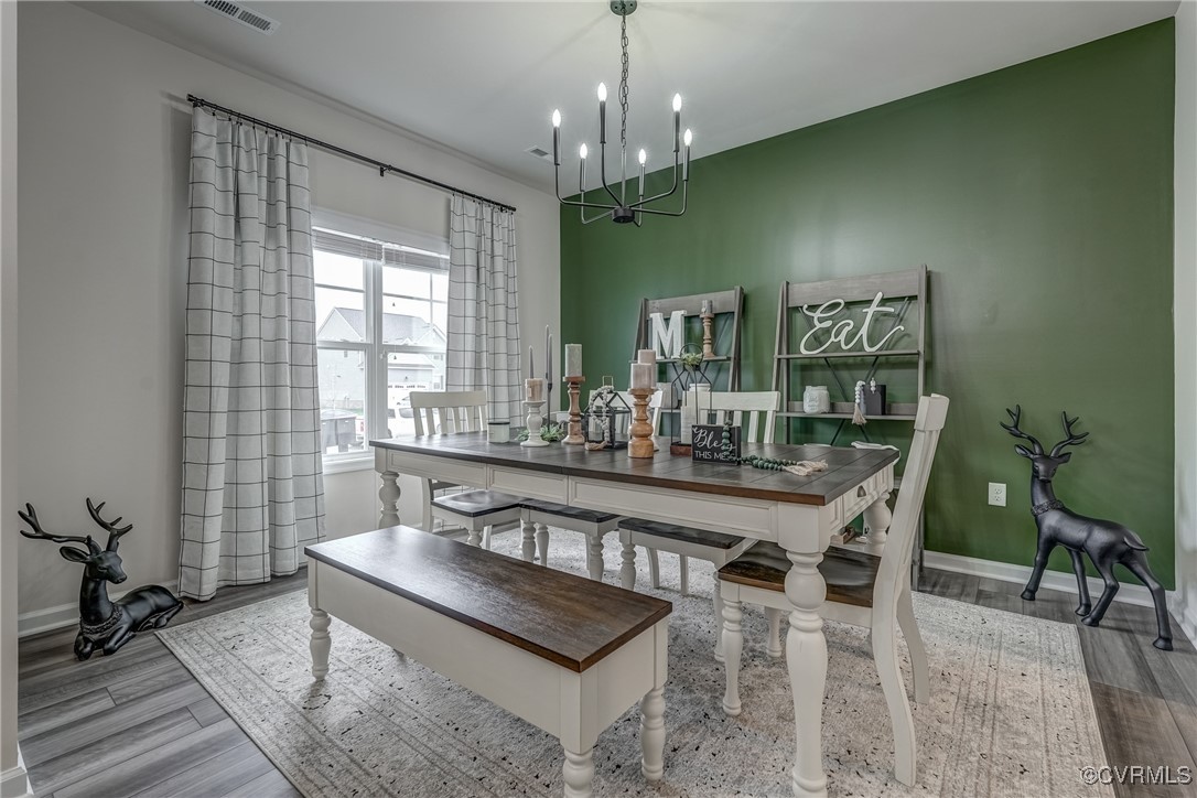7004 Havering Way Henrico, VA 23231 - Photo 9 of 50 Dining space featuring an inviting chandelier