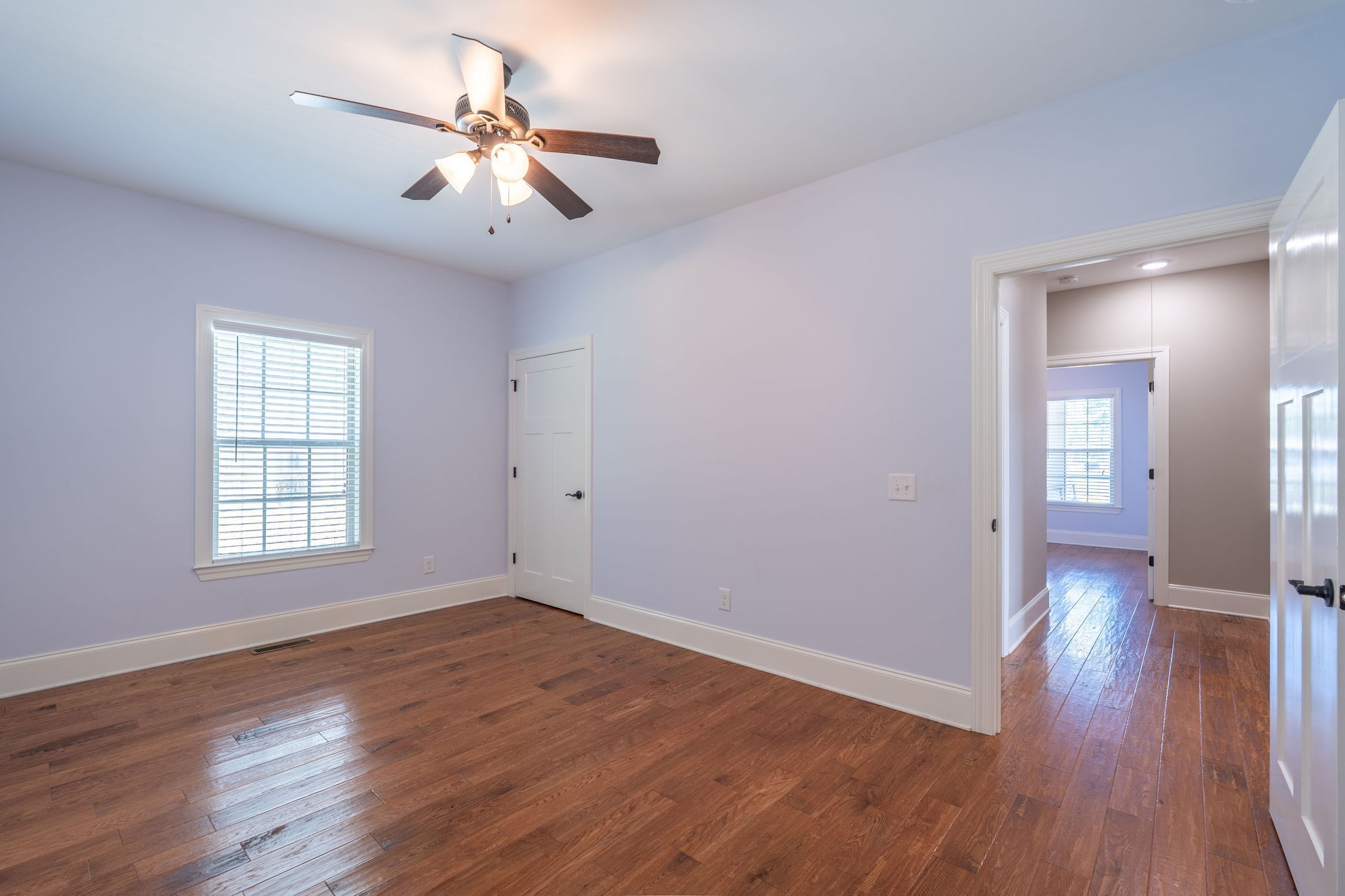 219 Waterloo Street Lawrenceburg, TN 38464 - Photo 20 of 39 wooden floor in an empty room with a window