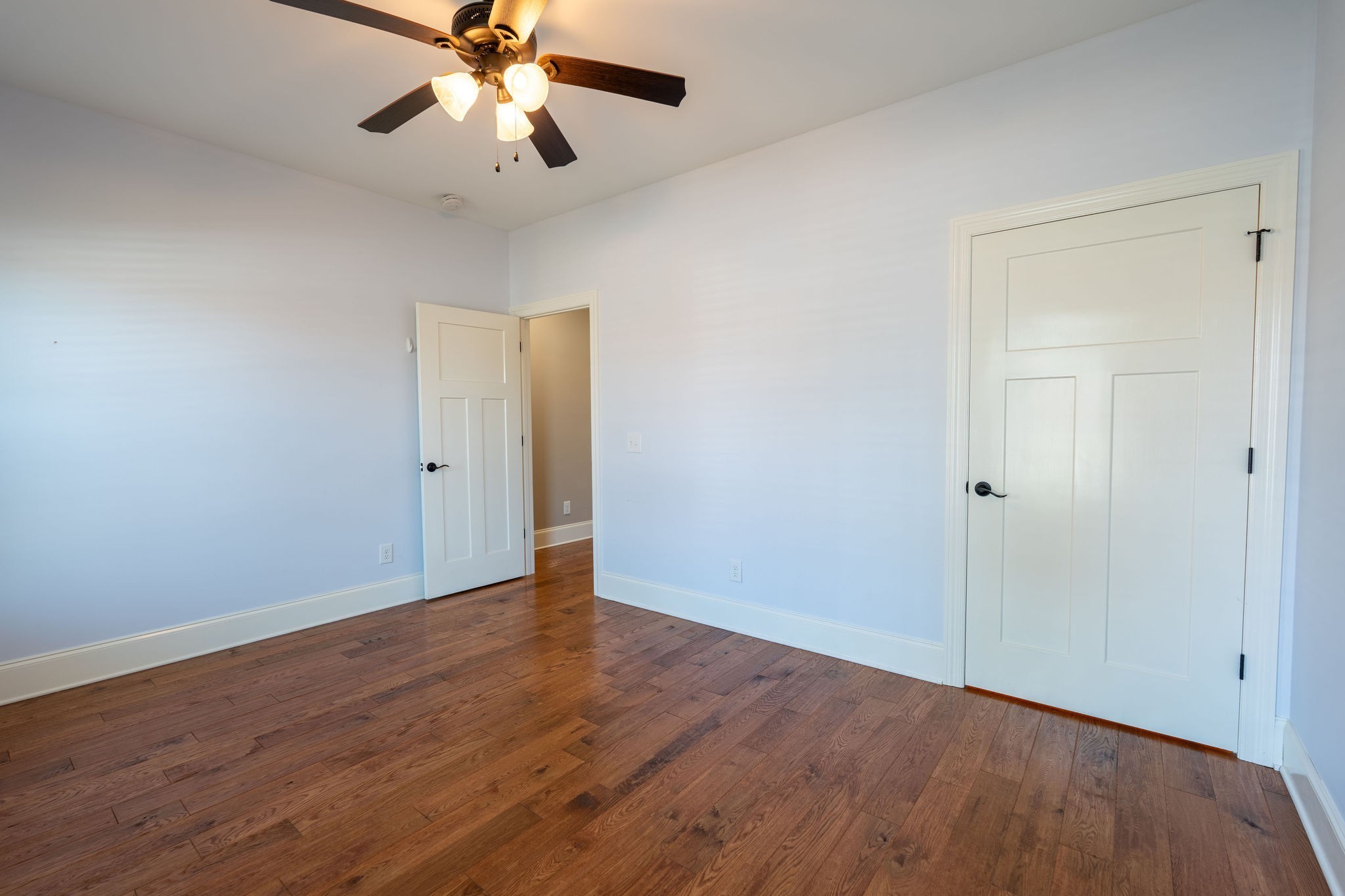 219 Waterloo Street Lawrenceburg, TN 38464 - Photo 23 of 39 a view of an empty room with window and wooden floor
