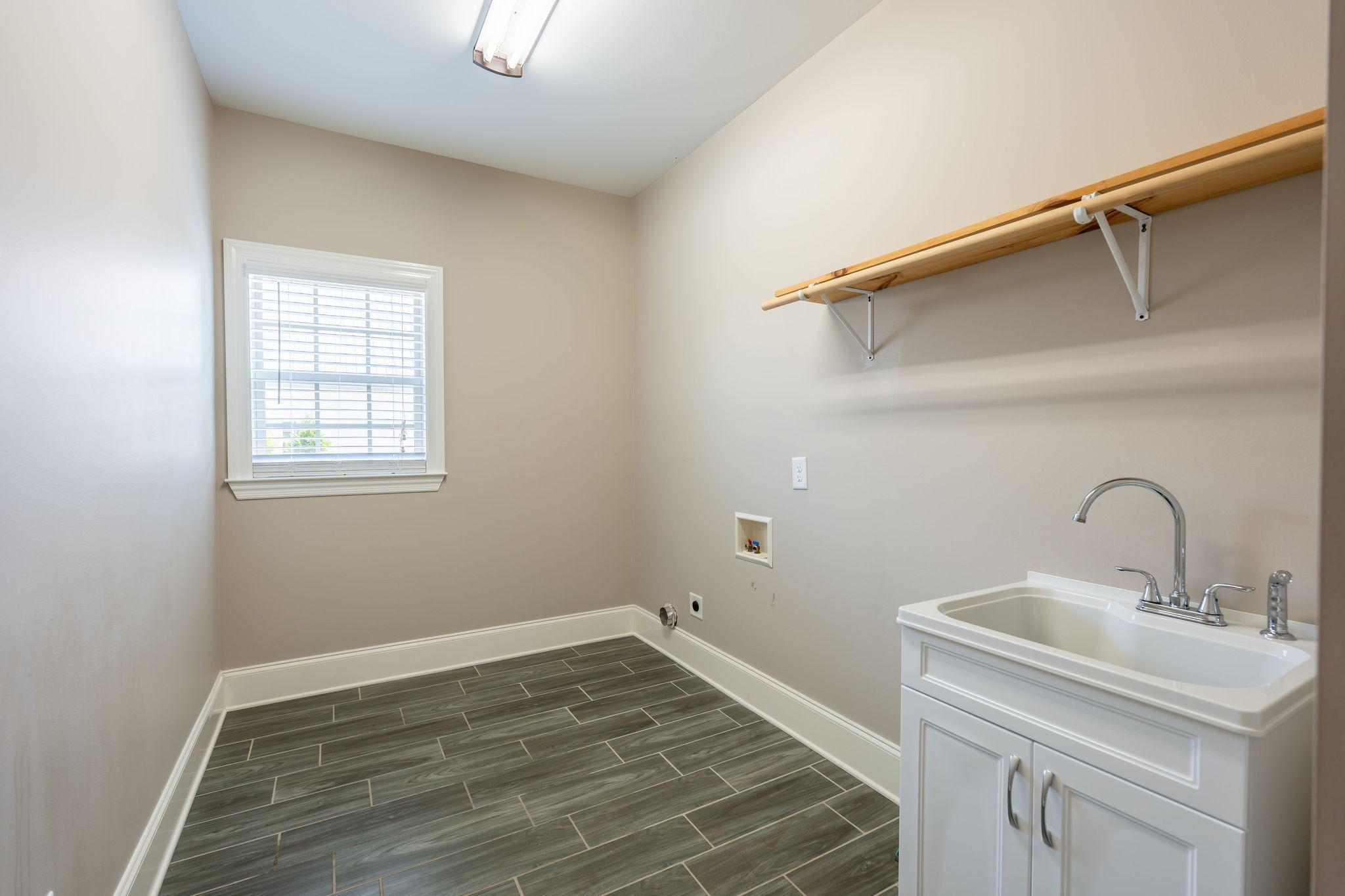 219 Waterloo Street Lawrenceburg, TN 38464 - Photo 24 of 39 a bathroom with a sink and vanity