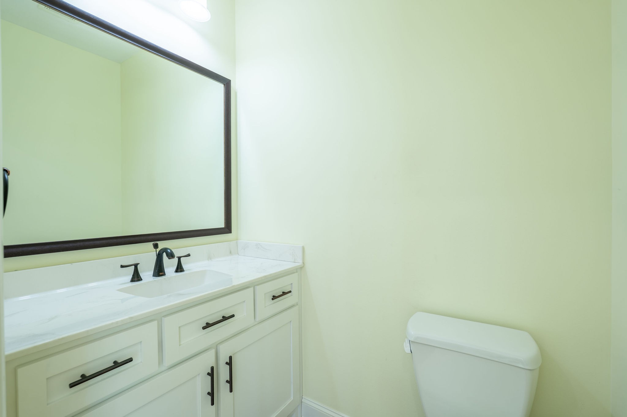 219 Waterloo Street Lawrenceburg, TN 38464 - Photo 27 of 39 a bathroom with a sink and a mirror