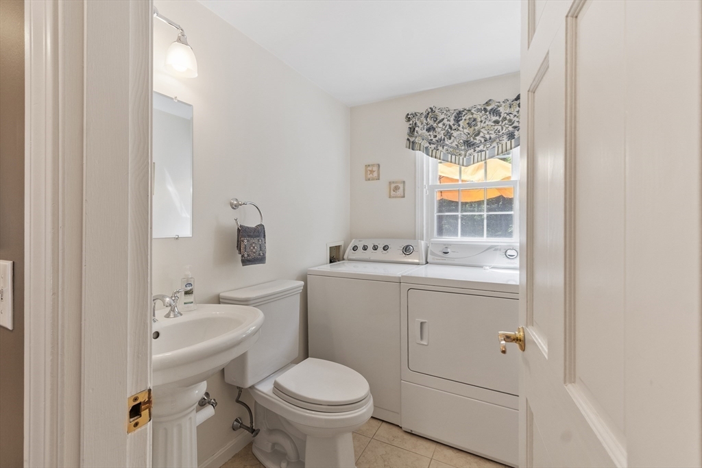 2 Pomfret Road Chelmsford, MA 01824 - Photo 17 of 38 a bathroom with a sink toilet and mirror