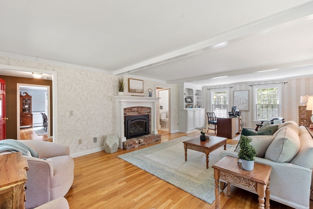 2 Pomfret Road Chelmsford, MA 01824 - Photo 21 of 38 a living room with furniture and a fireplace