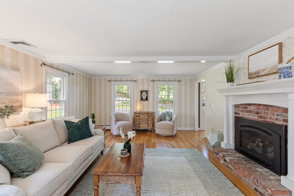 2 Pomfret Road Chelmsford, MA 01824 - Photo 22 of 38 a living room with furniture and a fireplace