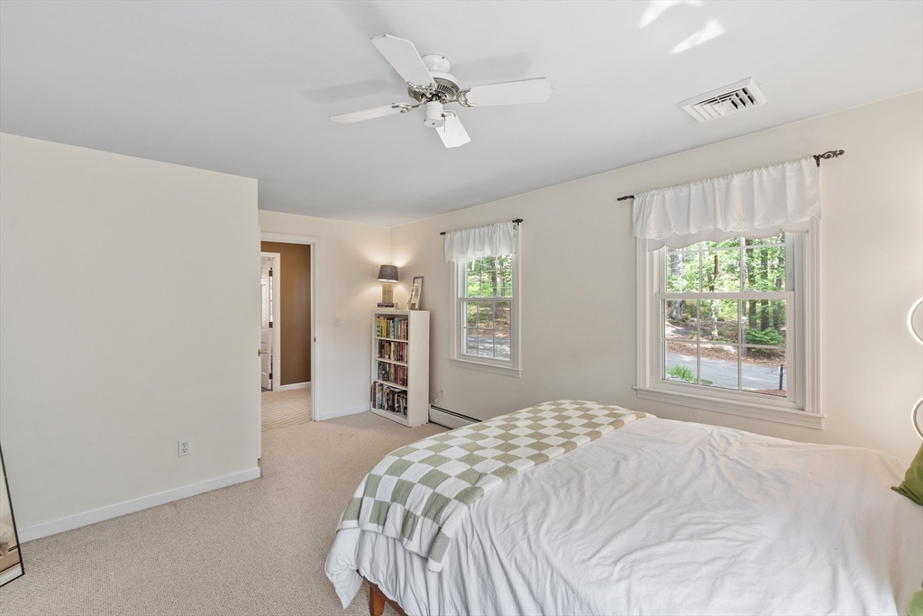 2 Pomfret Road Chelmsford, MA 01824 - Photo 29 of 38 a bedroom with a large bed and a window