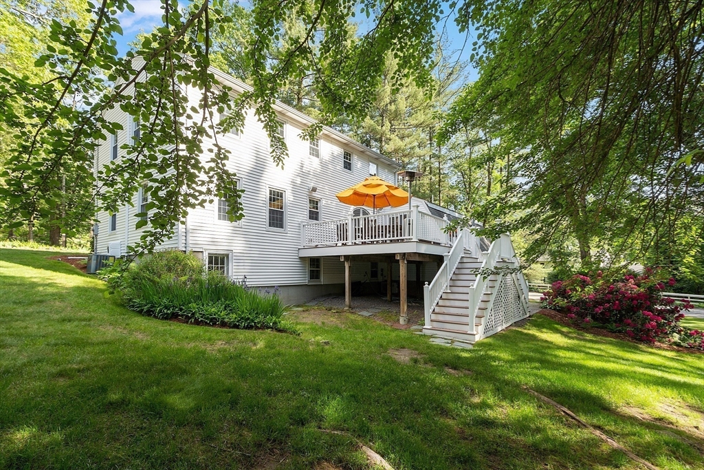2 Pomfret Road Chelmsford, MA 01824 - Photo 35 of 38 a view of house with a backyard