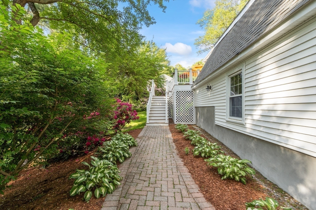 2 Pomfret Road Chelmsford, MA 01824 - Photo 36 of 38 a view of a pathway with flower plants
