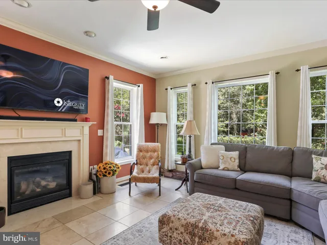a kitchen with stainless steel appliances granite countertop a refrigerator and microwave