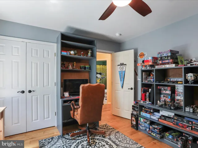 a view of a house with swimming pool and porch