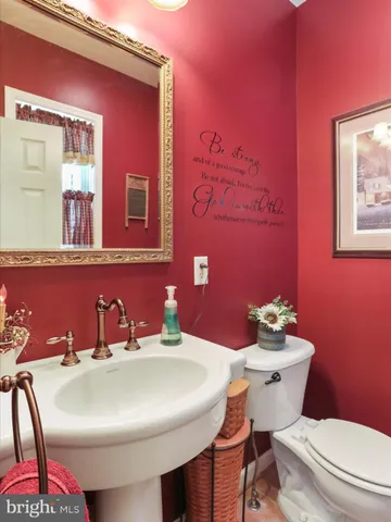 a view of a livingroom with furniture and wooden floor