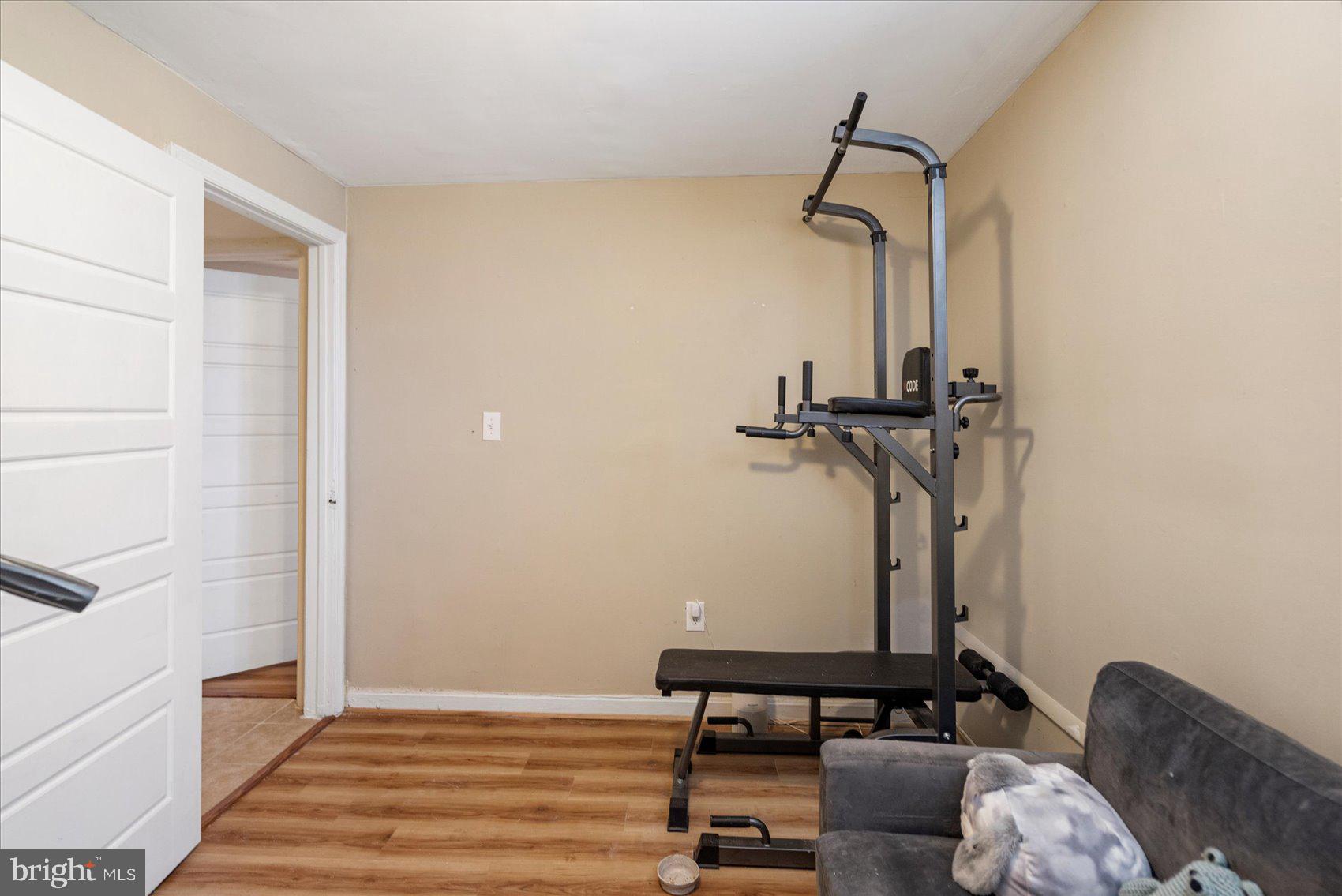 2304 Eutaw Place Baltimore, MD 21217 - Photo 34 of 105 a view of entryway and hall with wooden floor