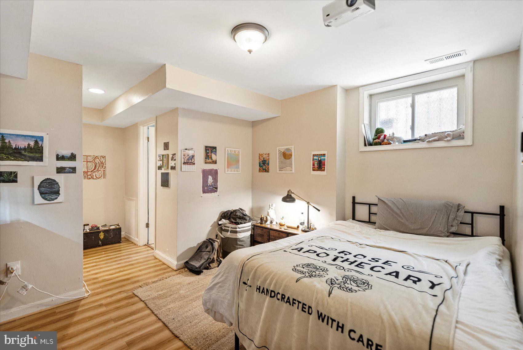 2304 Eutaw Place Baltimore, MD 21217 - Photo 35 of 105 a bedroom with double bed and a window