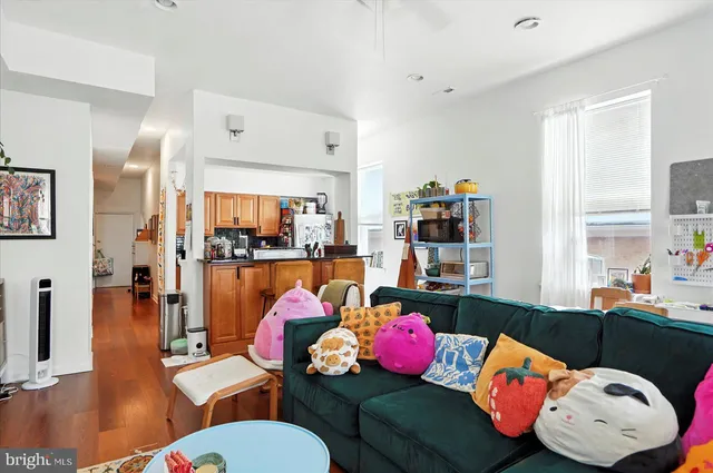 a view of a car parked in front of a house