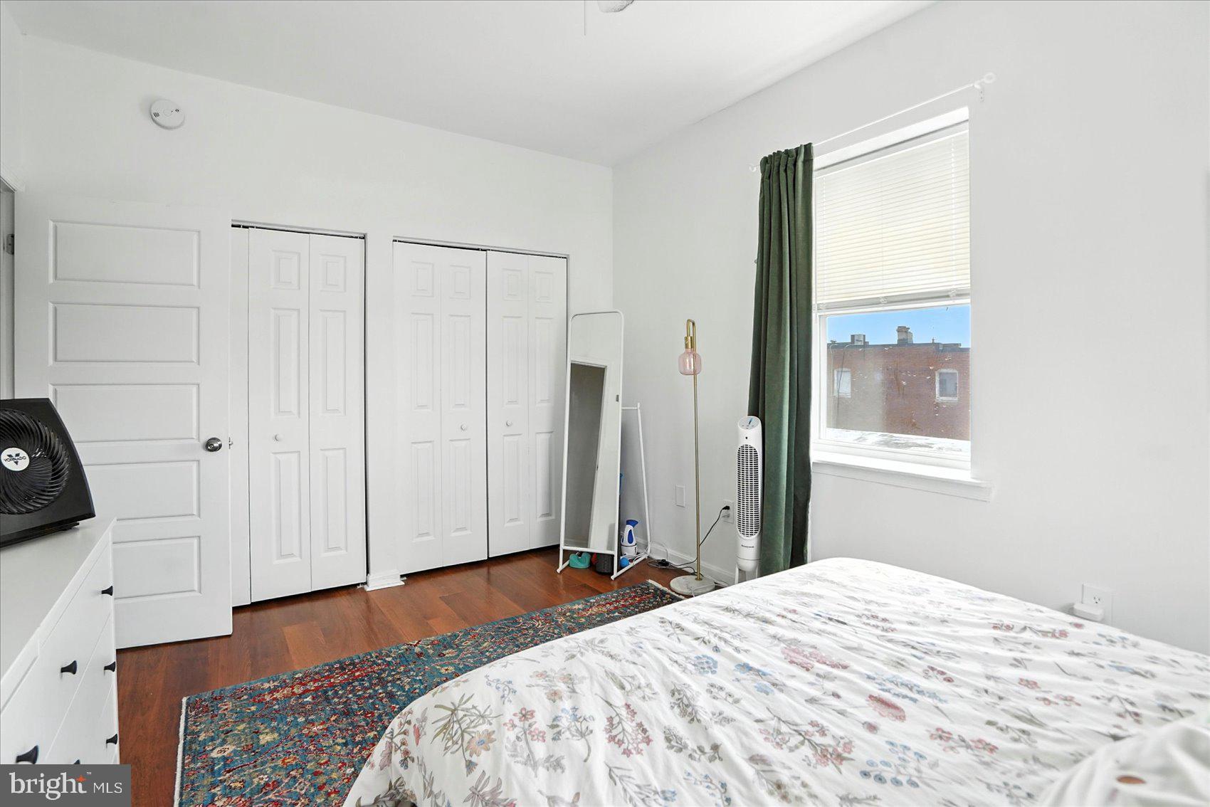 2304 Eutaw Place Baltimore, MD 21217 - Photo 60 of 105 a bedroom with a bed and a window